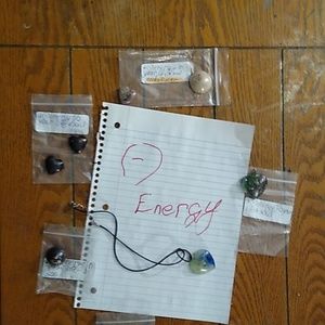 Necklaces and pendants with Chakra crystals for negative energy.
